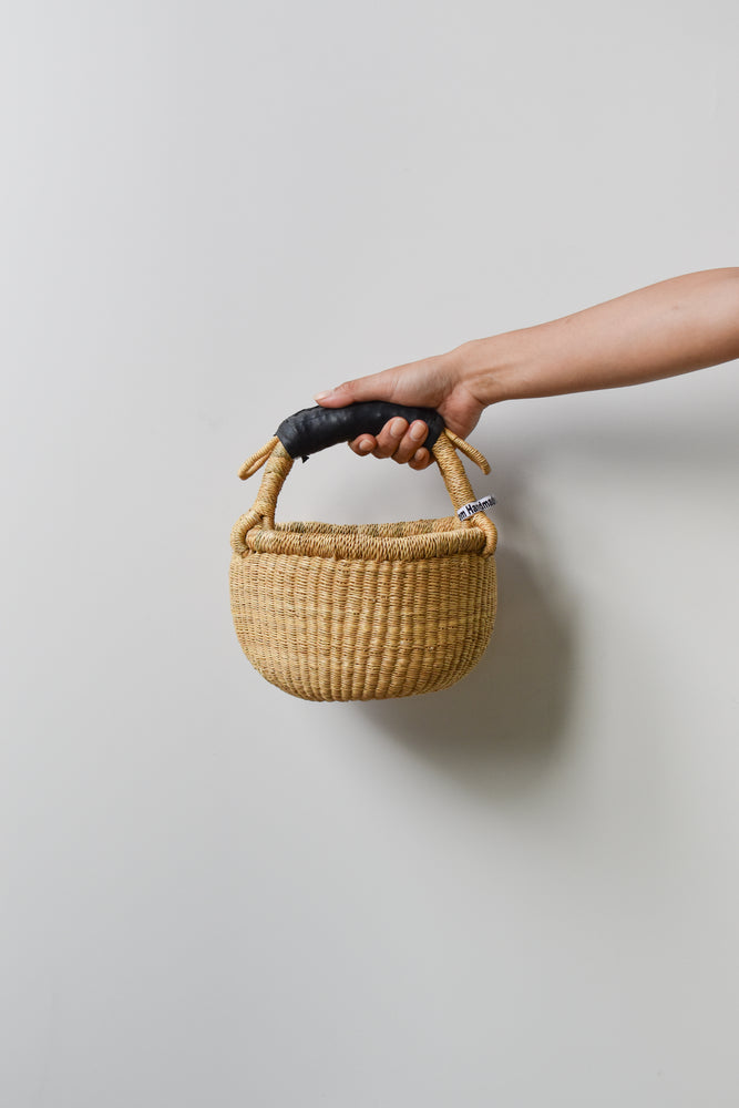 
                  
                    Natural Mini Round Basket (rubber handle)
                  
                