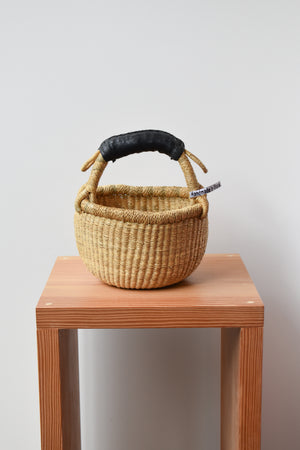 
                  
                    Natural Mini Round Basket (rubber handle)
                  
                